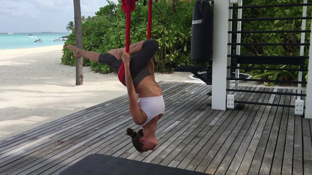 Aerial yoga in the Maldives