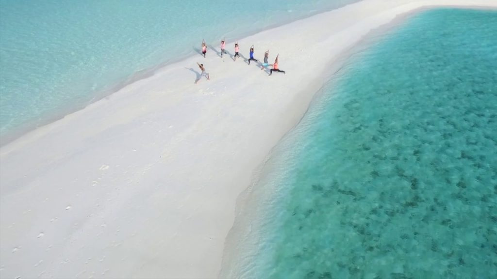 Yoga in the sandbank, Maldives